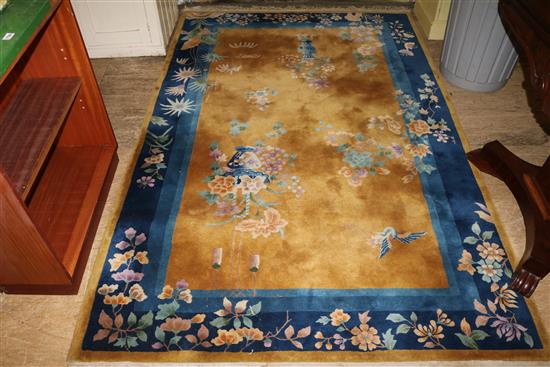 Blue bordered Chinese carpet